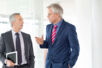 stock-photo-61369856-mature-business-men-discussing-work-in-office