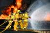 Feuerwehrmänner beim Löschen